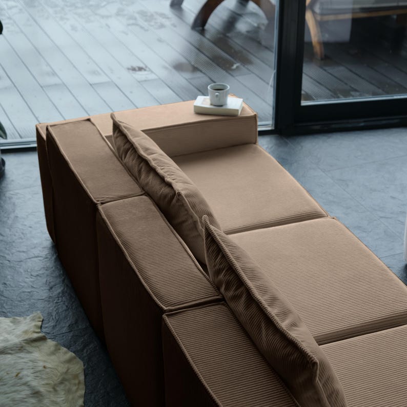 Clean lines meet teddy softness in this minimalist floor sofa. With washable covers and a comfortable sectional structure, it’s the perfect balance of modern simplicity and cozy relaxation.