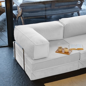 Crafted with soft teddy velvet, this sleeper sofa offers a minimalist design with washable covers—great for modern, functional livingroom spaces.