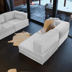 Featuring soft teddy texture, this velvet minimalist sofa doubles as a modern sleeper with washable fabric—an ideal blend for cozy and clean livingroom spaces.