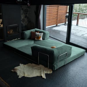 Velvet floor teddy couch styled low to the ground, providing casual comfort and modern minimalist charm.