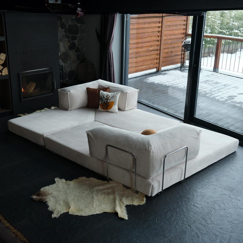 Designed for cozy evenings and stylish days, this teddy modular sofa bed is wrapped in soft velvet teddy fabric. It features a sleeper layout for guests, washable covers for easy care, and a modern design made for home comfort.