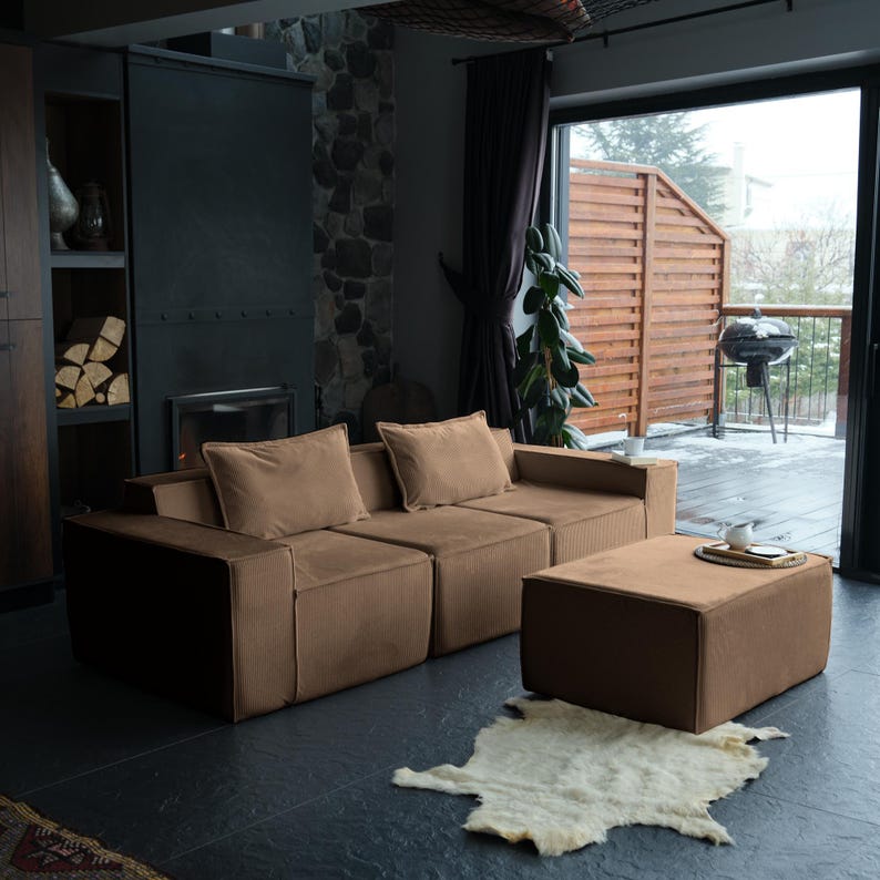 A washable teddy sofa crafted for minimalist interiors. Soft teddy cushions and a floor-level design make it a practical and cozy sectional for any home focused on warmth and simplicity.
