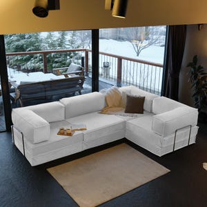 This teddy velvet sofa is a modern sleeper design with washable covers. Perfect for minimalist livingrooms that prioritize comfort, elegance, and functionality.