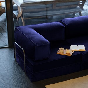 A versatile teddy modular sofa bed with washable covers, designed as a floor sofa bed to bring comfort and style to any living room.