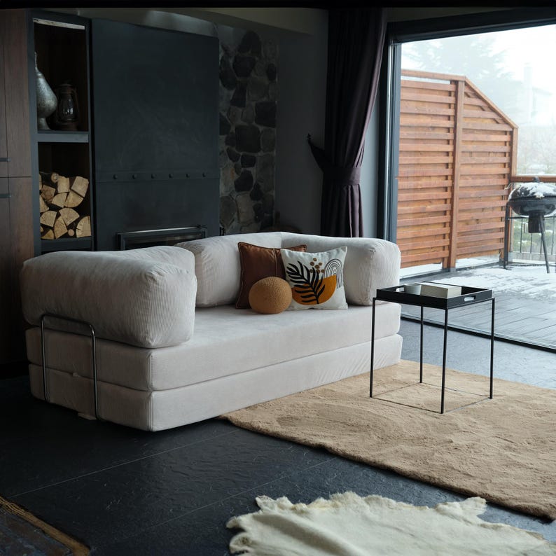 Plush sectional teddy couch styled in a U-shape for open-plan spaces, offering soft support for lounging, movie nights, or slow weekend mornings.