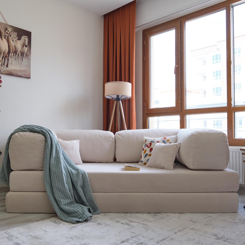 Comfortable sectional teddy sofa styled in a bright, cozy living room with plush cushions and soft lighting, perfect for relaxing evenings or casual hosting.