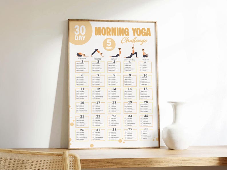 Printable morning yoga challenge in a wood frame on a shelf.