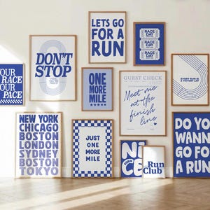 May include: A gallery wall set of twelve rectangular posters in wooden frames, featuring blue and white typography and graphic designs related to running, including phrases like "Don't Stop," "Lets Go For A Run," and "Meet Me At The Finish Line."