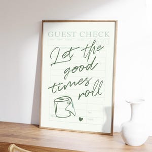 A printable "Let the good times roll" washroom artwork.