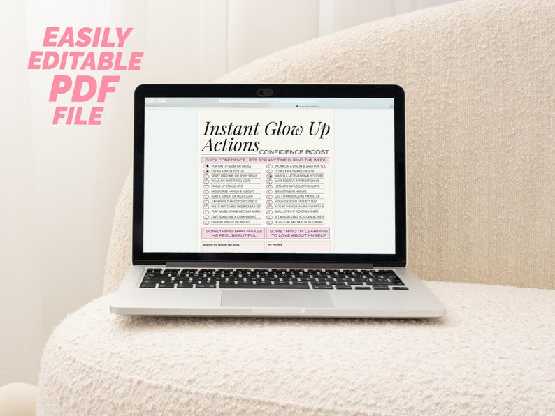 Easily Editable PDF file in text next to laptop on boucle sofa displaying editable worksheet titled Instant Glow Up Actions