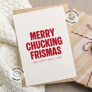 May include: A holiday greeting card with the text "MERRY CHUCKING FRISMAS AND HAPPY NEW YEAR" in red. The card is in a brown envelope, with a wrapped gift box with a pinecone and red and white twine.