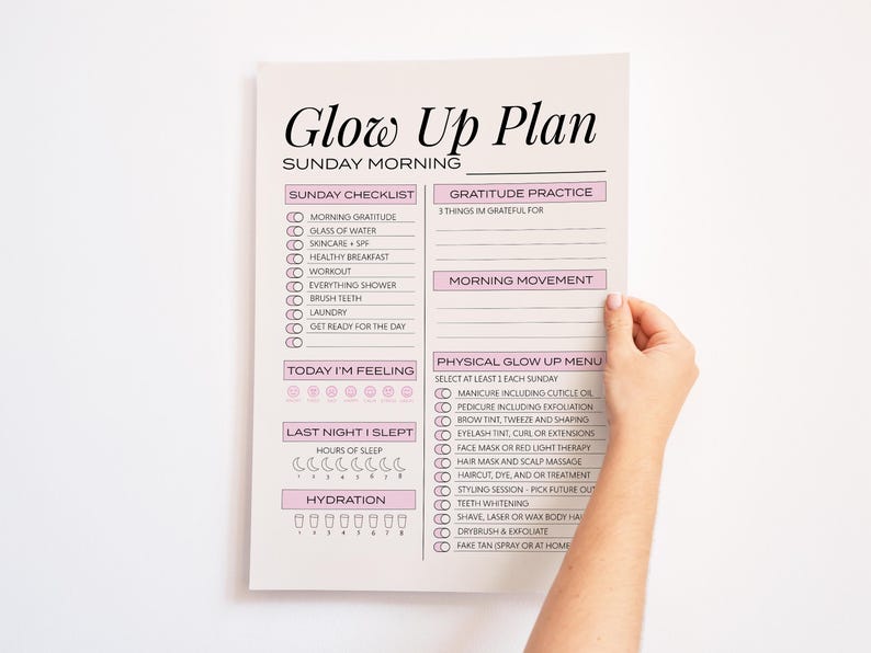 Hand holding printable Glow Up Plan.