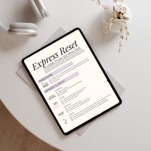 Sunday Reset Digital Planner displayed on iPad. It's the perfect Weekly Cleaning To Do List. This Printable Chore Checklist is Editable and makes keeping your home tidy an easy and fun routine. ADHD friendly and perfect for busy moms.