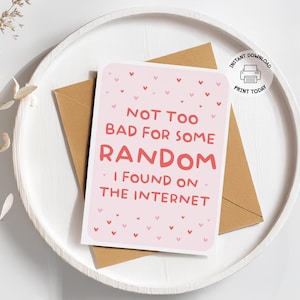 May include: A pink greeting card with the text "NOT TOO BAD FOR SOME RANDOM I FOUND ON THE INTERNET" and small heart illustrations. The card is on a brown envelope, placed on a white tray. A sticker reads "INSTANT DOWNLOAD PRINT TODAY".