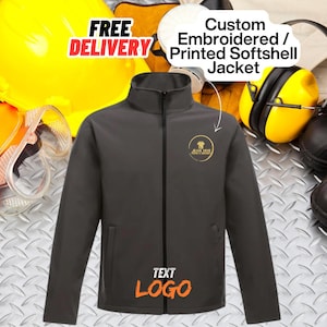 May include: A dark grey softshell jacket with a full zip and a small logo on the chest. The jacket has the text "TEXT LOGO" in orange at the bottom. The image also includes the text "FREE DELIVERY" and "Custom Embroidered / Printed Softshell Jacket".