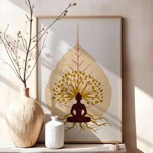 May include: A framed art print featuring a seated Buddha figure within a stylized leaf design in shades of beige, brown, and gold. A light-colored vase with branches and a small white vase are on a shelf.
