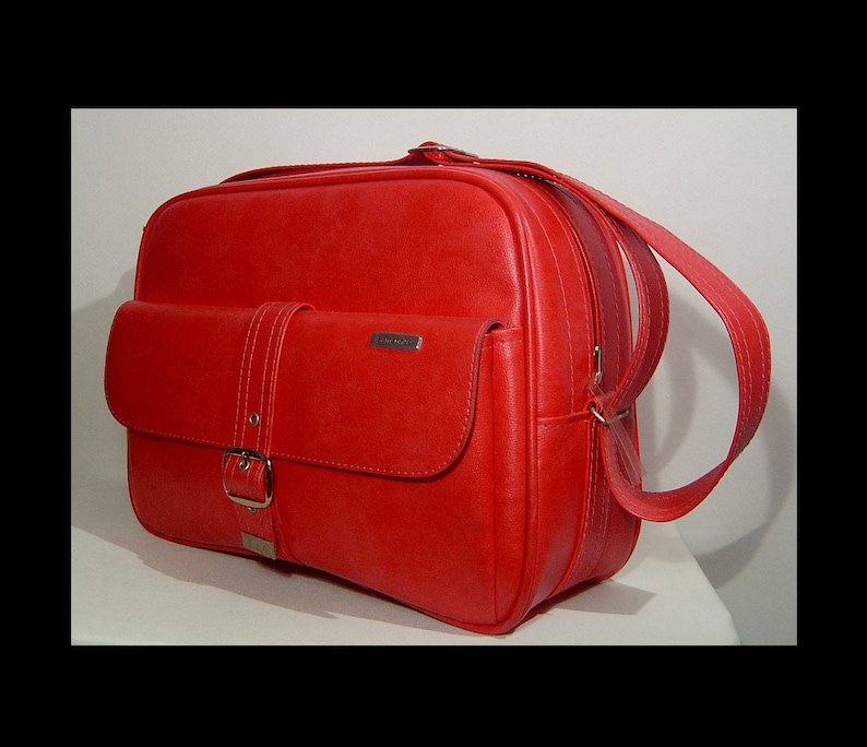 1970s hot pink red Samsonite Canada carry on flight bag suitcase w long adjustable strap ~ top zipper ~ vinyl travel duffel case gym duffle