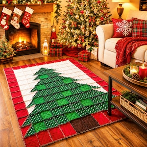 May include: A rectangular rag quilt rug featuring a central Christmas tree design made of green and white polka dot fabric squares, set against a white background with a wide red border, all constructed with frayed edges and visible stitching.