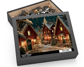May include: A 500-piece jigsaw puzzle in a black box, featuring a winter village scene with red houses, snow-covered roofs, and glowing windows. The box lid displays the text 16x20 Puzzle 500 pcs Ages 9+ and a barcode. Loose puzzle pieces are visible inside.