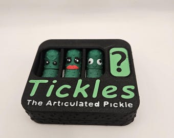 The Articulated Pickles keychain W/ Surprises Pickle Ornaments.