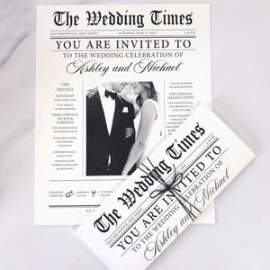May include: Wedding invitation set designed to resemble a newspaper, titled "The Wedding Times." The invitation features a black and white photo of a couple and includes event details. The set is tied with a black string.