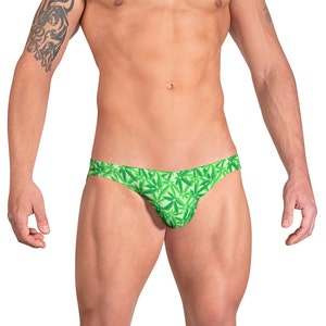 May include: Green and white patterned men's underwear with a leaf design.