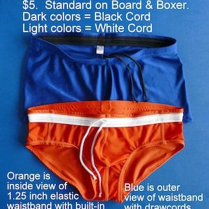 May include: Two swimsuits, one blue and one orange, with a white elastic waistband and a drawstring. The blue swimsuit is shown from the outside, with the drawstring hanging out the front. The orange swimsuit is shown from the inside, with the drawstring tucked inside the waistband. The text "Optional drawcord available on Brief, Retro Brief & Squarecut for $5. Standard on Board & Boxer. Dark colors = Black Cord Light colors = White Cord" is visible at the top of the image.