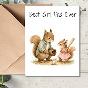 May include: A greeting card with the text "Best Girl Dad Ever" features a watercolor illustration of two squirrels. One squirrel wears a green shirt and holds a baseball glove, while the other wears a pink dress and holds a bat. A brown envelope is included.