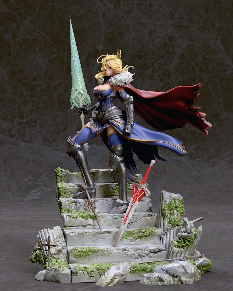 May include: A detailed figurine of a female character in a blue and gold armor, holding a green spear. She is standing on a stone platform with a red sword and a smaller sword. The figurine is set against a dark gray background.