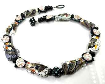 Art necklace from Lampwork glass beads,  girls and penguins, siblings, friends , Murano glass beads