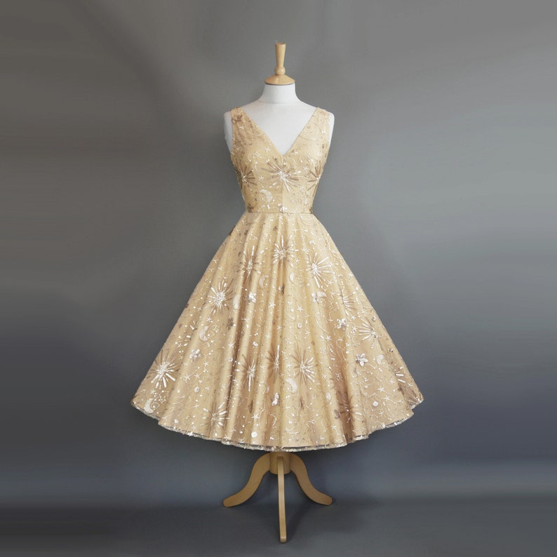 Vintage Inspired Wedding Dresses | Vintage Style Wedding Dresses     Clara Tea Length Wedding Dress in Gold Star & Moon Sequin Lace and Pale Gold Taffeta 1950s Cocktail Dress - Made To Order by Dig For Victory  AT vintagedancer.com