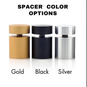 May include: Image shows three cylindrical spacers in gold, black, and silver. Each spacer has a round top and bottom, connected by a threaded screw. The text "SPACER COLOR OPTIONS" is at the top, with the colors labeled below each spacer.