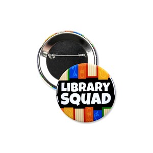 Paquete de 15 insignias de botón Scholastic &quot;Library Squad&quot; (5,7 cm)
