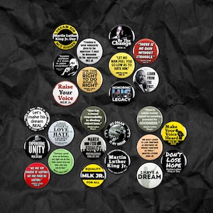 May include: A collection of 16 round buttons with colorful backgrounds and black text. The buttons feature quotes from Martin Luther King Jr. about equality, justice, and peace. The buttons are perfect for adding a touch of inspiration to your home, office, or classroom.