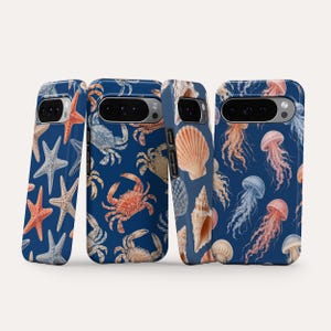 May include: Four smartphone cases featuring marine life patterns on a dark blue background. The designs include orange and white starfish, various crabs, tan seashells, and pink and blue jellyfish, all arranged in a repeating nautical motif.