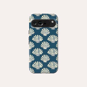 May include: A blue phone case with a white seashell pattern.