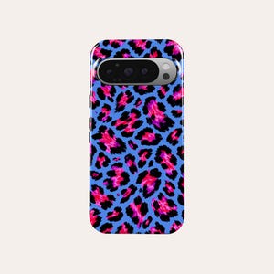 May include: A smartphone case with a vibrant leopard print design. The case features a bright blue background with pink, black, and purple spots. The phone's camera and sensors are visible at the top.