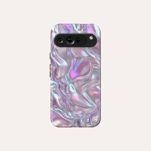 May include: A phone case with a holographic iridescent design. The case has a pearlescent finish with swirls of pink, purple, and blue.