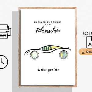 May include: A framed print with a car design made of money, with the text "Kleiner Zuschuss zum Führerschein" and "& allzeit gute Fahrt". The car's wheels are made of currency, and the car's body is filled with a green bill.