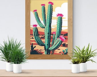 Könnte beinhalten: Gerahmter Kunstdruck mit einer stilisierten Illustration einer Wüstenlandschaft. Ein großer türkisfarbener Kaktus mit rosa Blüten steht im Mittelpunkt. Der Hintergrund zeigt einen gelben Himmel, rote Berge und Wüstenpflanzen. Der Rahmen ist aus hellem Holz.