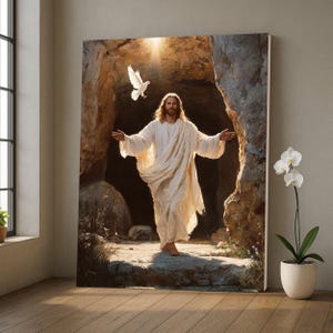 May include: A large canvas print shows a figure in white robes with outstretched arms emerging from a cave, with a white dove in flight above. The artwork uses warm tones and a bright light from the cave entrance, suggesting a religious theme.