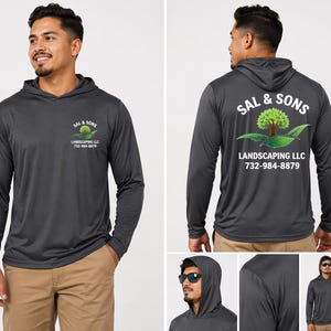May include: Dark gray long-sleeve hooded shirt with the text "SAL & SONS LANDSCAPING LLC" and a logo of a tree and leaves. The shirt is made of a lightweight material and has a hood and long sleeves.