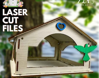 May include: A wooden birdhouse with a blue heart and a green bird cutout. The text "LASER CUT FILES" and "Digital Download" are displayed. The birdhouse is designed for laser cutting.