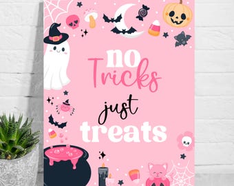 May include: Pink Halloween-themed sign with the text "no tricks just treats." The sign features cartoon illustrations of a ghost, pumpkin, bats, spider, cauldron, and candy corn. A decorative item for the Halloween season.