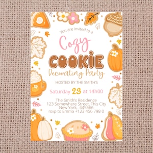 May include: A Cozy Cookie Decorating Party invitation with a white background and a burlap texture. The invitation features illustrations of cookies, pumpkins, and fall leaves. The text includes the date, time, and location.