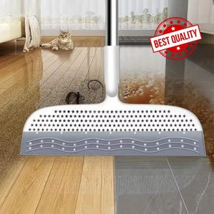 May include: A white and gray floor squeegee with a handle. The squeegee head has a star pattern and a wavy design. The image shows the squeegee cleaning a floor, with the text "BEST QUALITY" in a red circle.