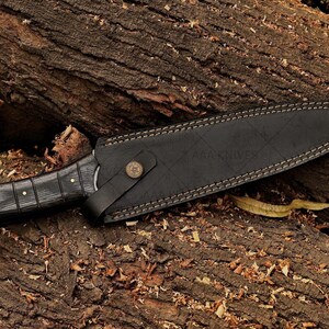 Rambo-style fixed blade knife with full tang construction.