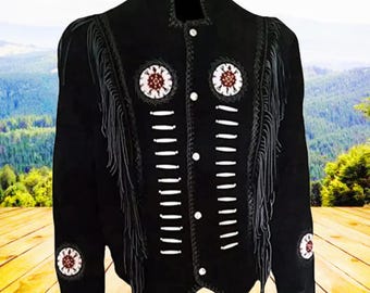 May include: Black suede jacket with decorative fringe, white stitching, and circular embroidered accents. The jacket has a high collar and button closures. The design incorporates Native American-inspired elements, creating a unique outerwear piece.