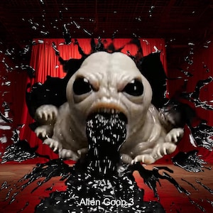 May include: A grotesque, pale creature with large black eyes and an open mouth spewing black liquid. The creature is breaking through a black surface, with black liquid splattering around it. The text "Alien Goop 3" is at the bottom.