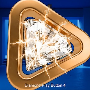 May include: A gold-colored play button with a diamond-shaped center. The diamond is faceted and reflects light. Lightning-like effects surround the diamond. The text "Diamond Play Button 4" is at the bottom.